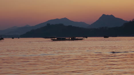 sunset river cruise with mountains