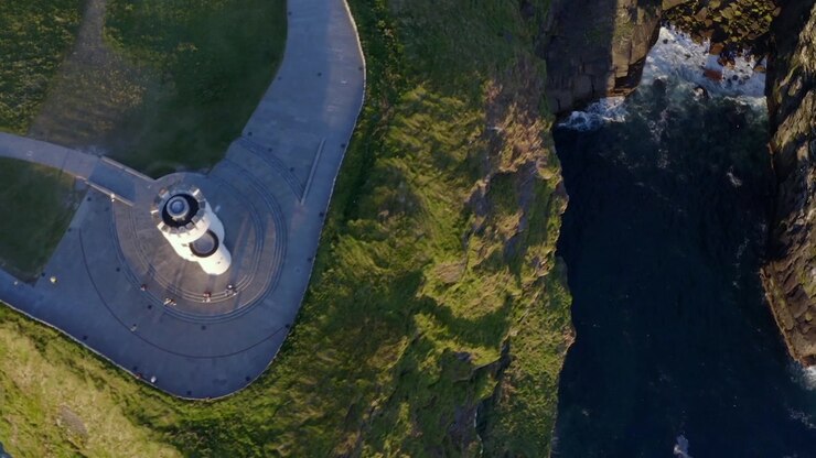 Aerial top down view of O'Brien's Tower at the edge of Cliffs of Moher