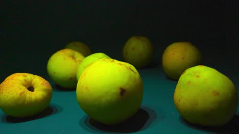 close-up of quinces on dark background