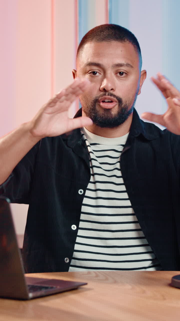 A man speaking to the camera
