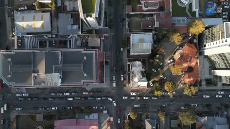 Aerial-top-down-shot-over-roads-and-residential-buildings-in-La-Paz,-Capital-City-of-Bolivia-during-morning-time