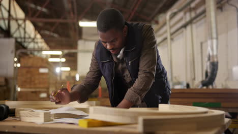 man woodworking in workshop