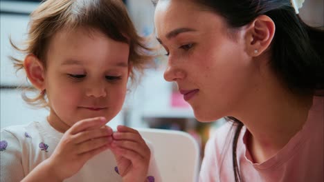 A Heartwarming Moment Between a Child and Caregiver Engaged in Creative Play, Illustrating Connection, Joy, and Learning Through Hands-On Activities