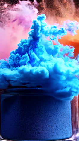 a jar of colorful powder is sitting on a table with a cloud of powder surrounding it. the jar is blue and the powder is pink, orange, and purple. concept of creativity and playfulness