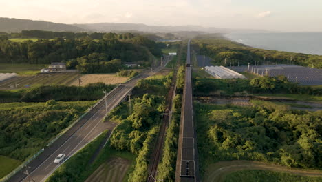 long line of solar panels installed on an abandoned monorail track in kyushu, japan