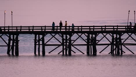 The-Mon-Bridge-is-an-old-wooden-bridge-located-in-Sangkla,-Thailand