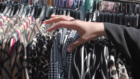 woman browsing clothes in a shop
