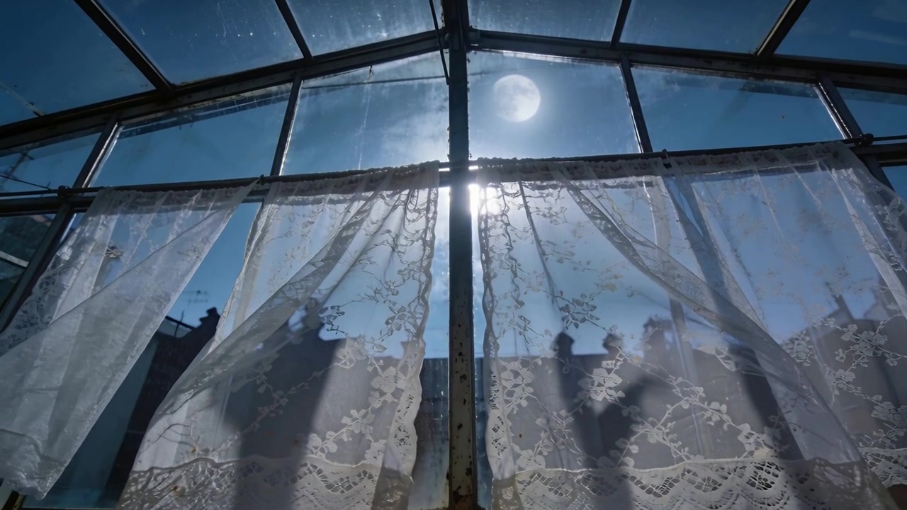 Billowing lace curtain swaying in wind in glass window, casting chimney shadows, steam rising phone