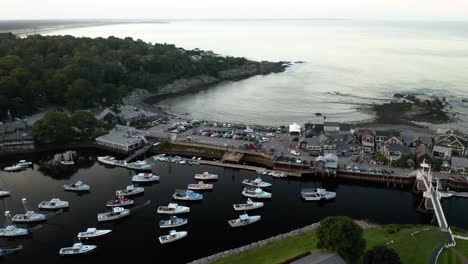 aerial footage of shops and perkins cove in ogunquit, maine at sunset