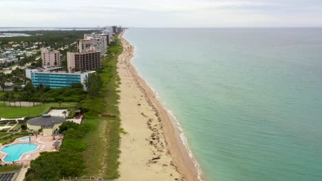 Touristic-Oceanfront-Beach-Resorts-on-Hutchinson-Island,-Florida---Aerial