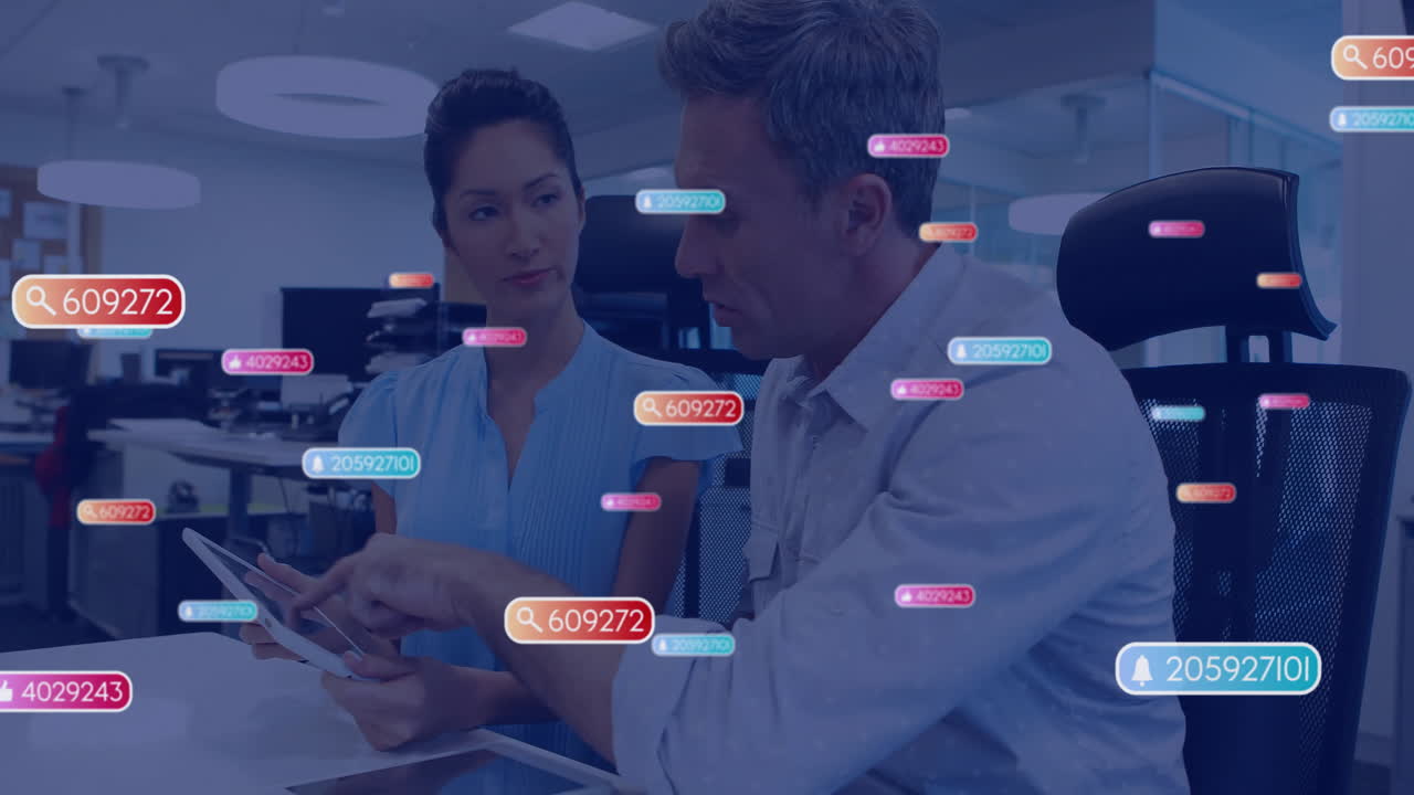 Animation of icons and data processing over diverse business people using tablet