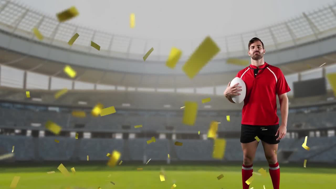 프로 럭비 선수 가 콘페티 가 떨어지는 경기장 앞 에 서 있다