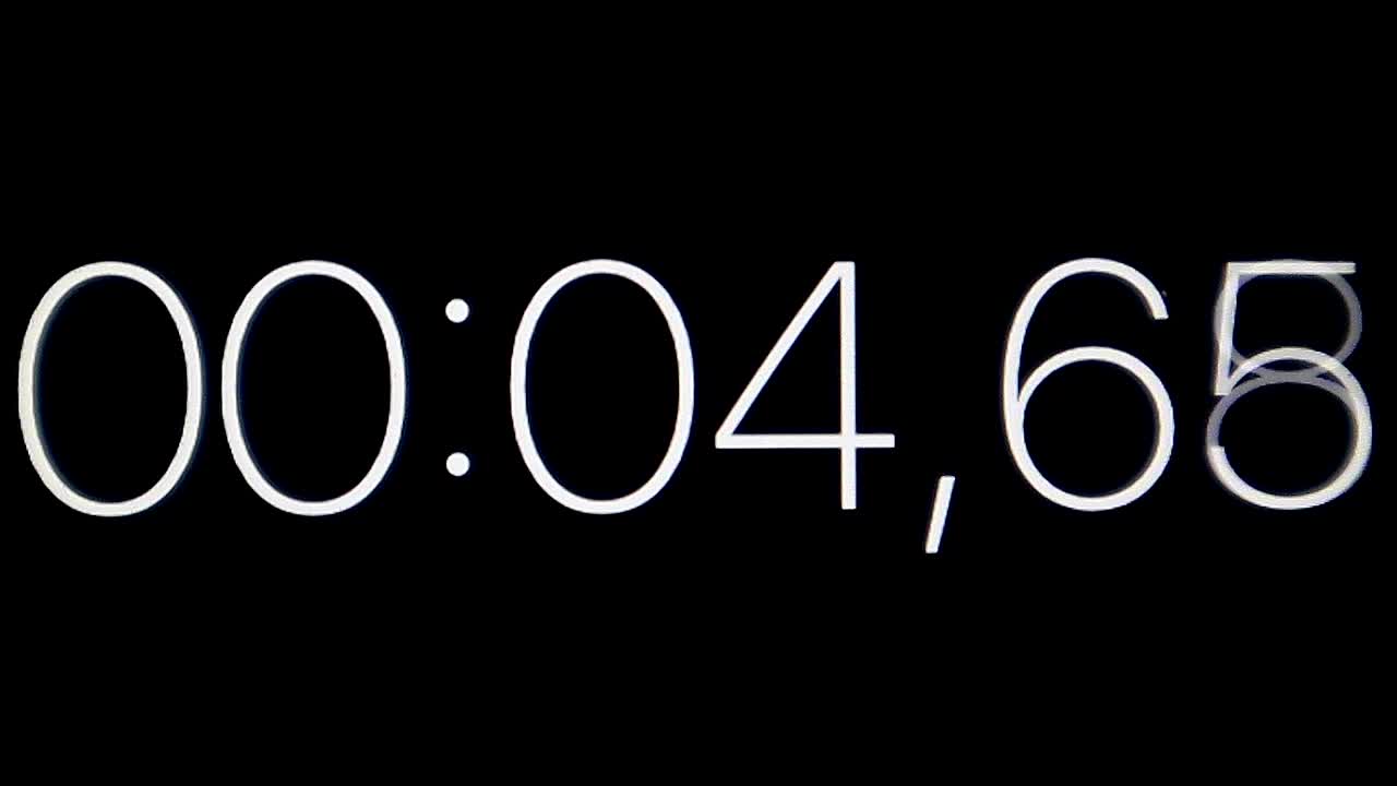 Clock with white numbers on black background