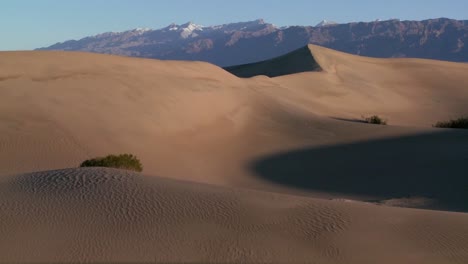 a telephoto shot across the desert dunes at death valley 1