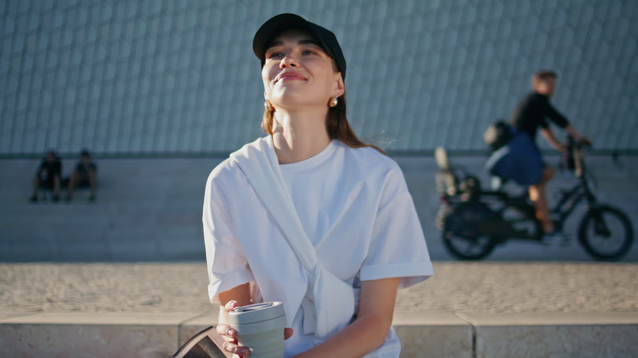Serene woman drinking beverage enjoying morning sunlight closeup. Relaxed girl