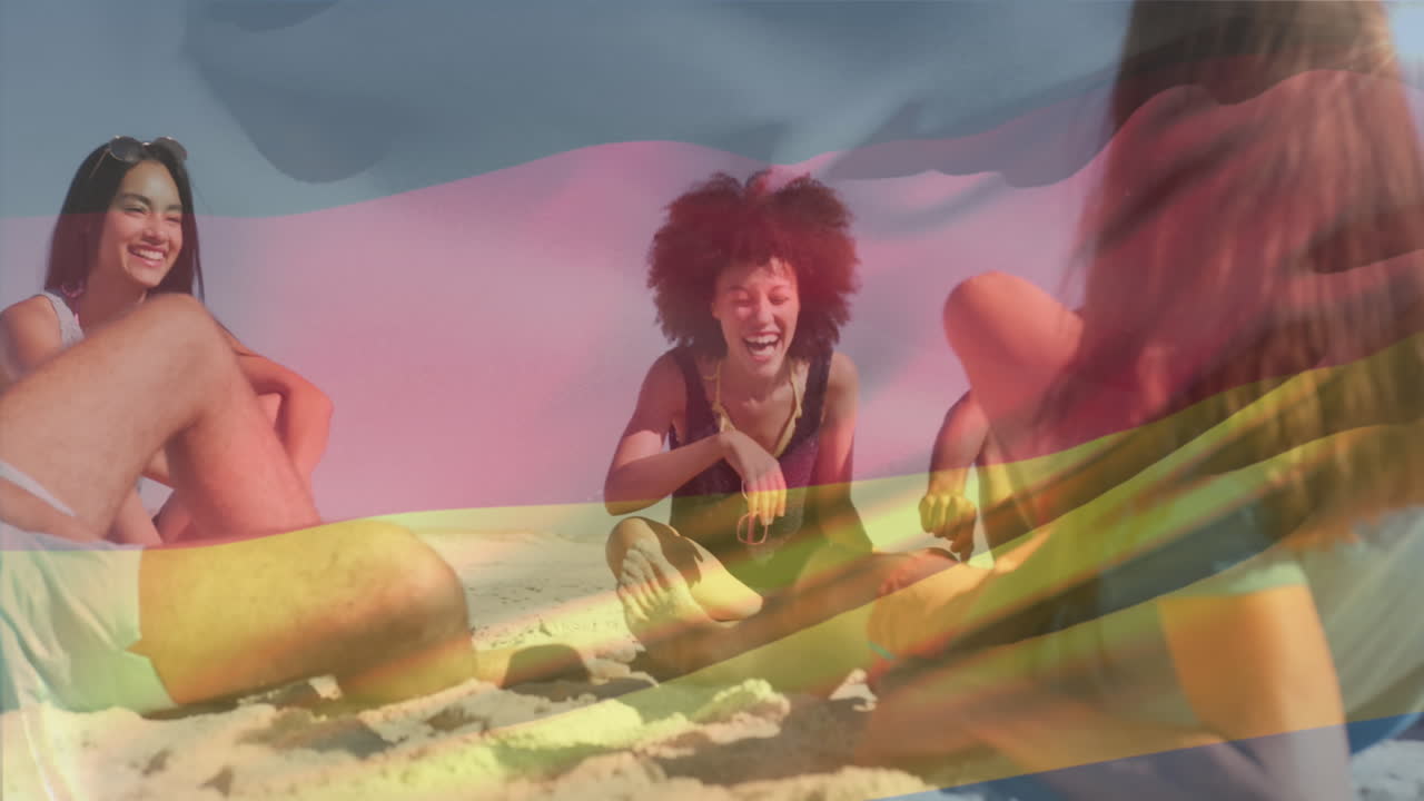 animación de la bandera alemana ondeando sobre diversos amigos sentados y disfrutando en la playa