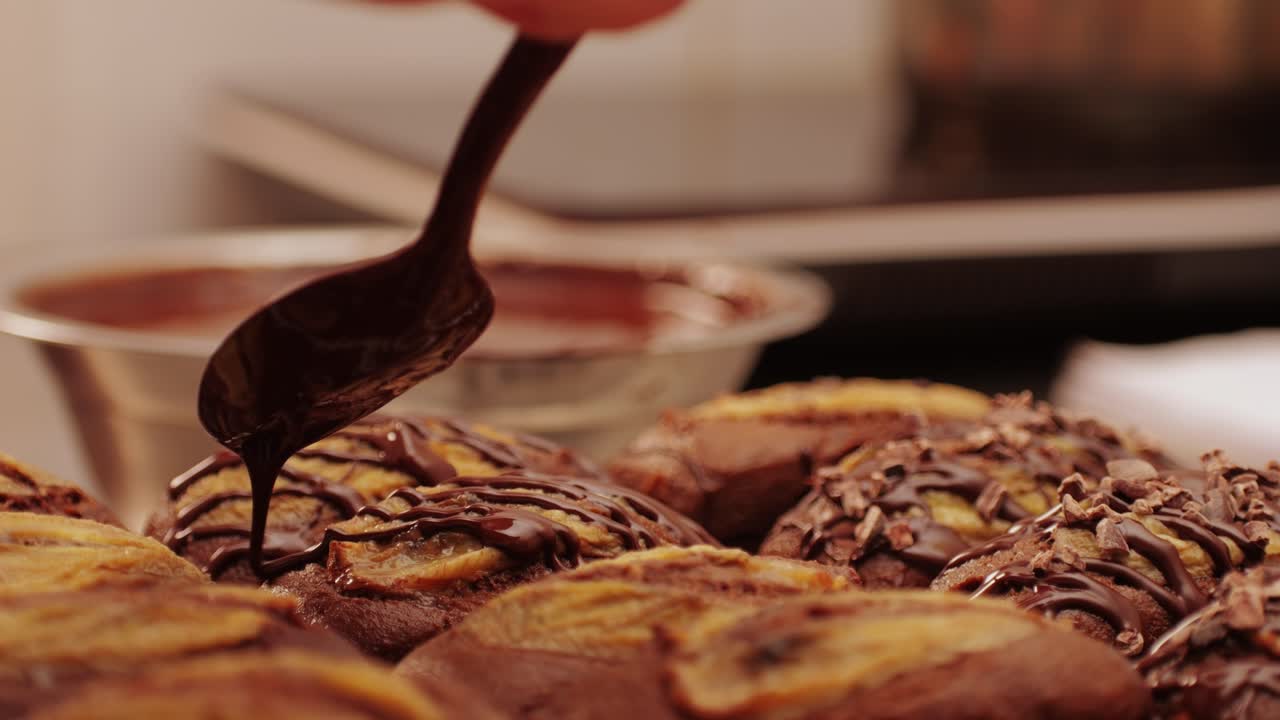 Fresh bake double chocolate banana artesian bread in bakery shop close-up. Artisan bread is making by skill bakers using natural and high-quality ingredients. Food with health and flavour benefits. Sweet breads for dessert and breakfast