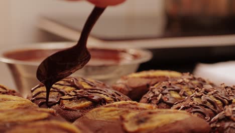 fresh bake double chocolate banana artesian bread in bakery shop close-up. artisan bread is making by skill bakers using natural and high-quality ingredients. food with health and flavour benefits. sweet breads for dessert and breakfast