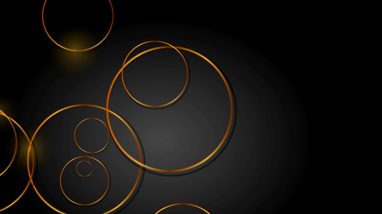 Abstract dark geometric video animation with golden rings
