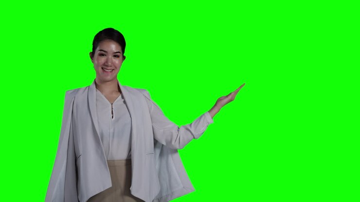 Business newscaster female is reporting unusual circumstances and reporting economic news with isolate green screen background or chroma key.