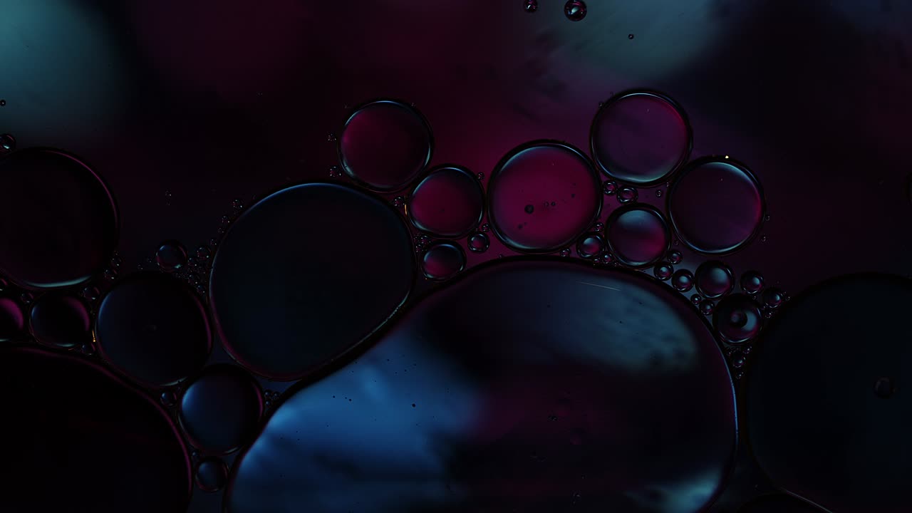 Abstract Colorful Food Oil Drops Bubbles and spheres Flowing