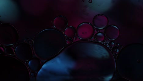 abstract colorful food oil drops bubbles and spheres flowing