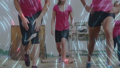 Animation-of-light-trails-over-caucasian-women-at-obstacle-course-exercising