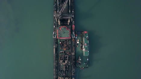 Top-View-Of-A-Crane-Vessel-With-Cargo-In-The-Sea-Near-Paradeep-Seaport-In-Odisha,-India