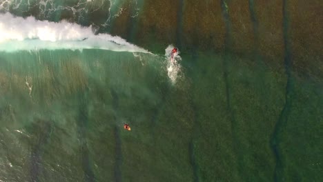 Flying-Over-Surfer-Catching-a-Wave