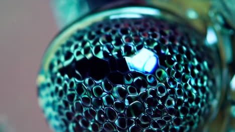 abstract macro of iridescent faceted sphere