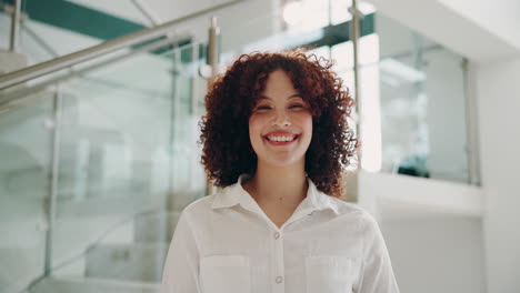 smiling businesswoman standing in an office