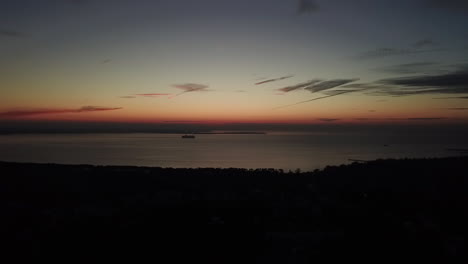 A-ship-moving-on-the-ocean-coastline-on-the-evening