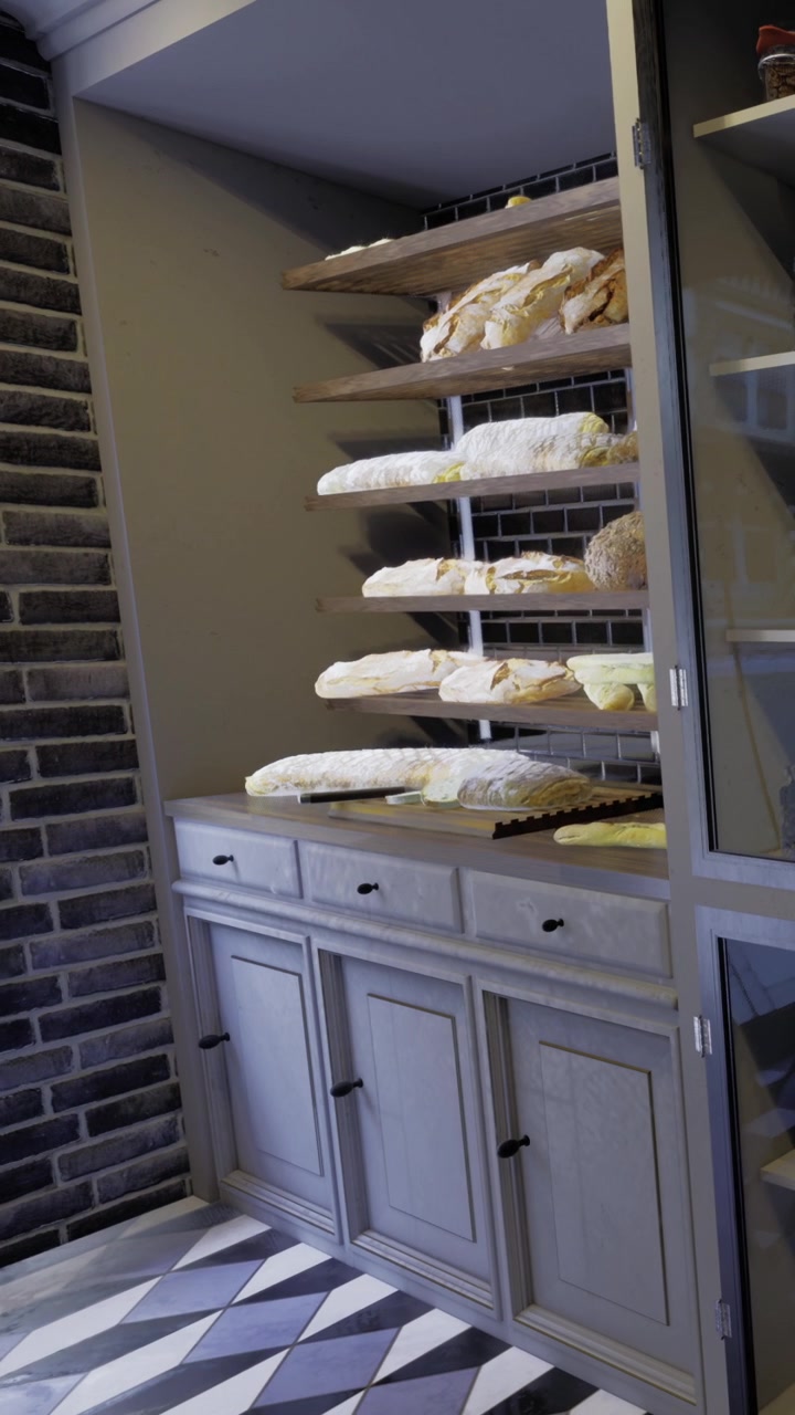 Area espositiva di panetteria che mostra pane fresco sugli scaffali con un mobile contenitore grigio.