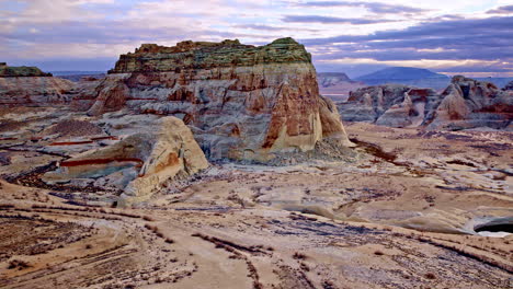 a mesmerizing high-angle drone shot emphasizing the natural artistry of the red rock formations near lake powell.