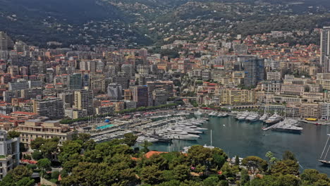 monaco aerial v17 establishing shot drone fly around la condamine neighborhood capturing famous port hercule and hillside downtown cityscape - july 2021