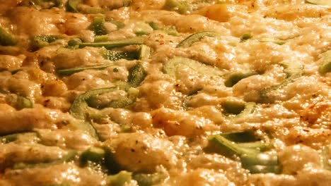 Delicious-crispy-pizza-with-dough,-cheese,-chicken-breast,-green-bell-peper-and-tomato-sauce