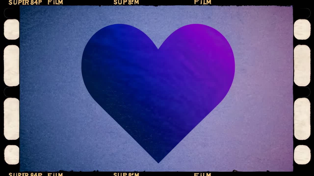 Vintage film-style video frame featuring a purple heart on a textured background