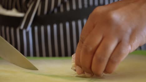 Chopping-shallots-to-add-to-the-homemade-salad-dressing---ANTIPASTO-SALAD-DRESSING