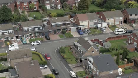 Quiet-British-houses-streets-and-gardens-residential-suburban-property-aerial-view