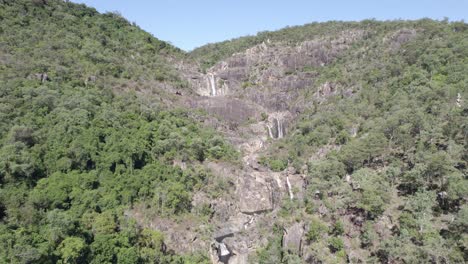 Picturesque-Cascades-Fringed-By-Lush-Rainforest-At-Jourama-Falls