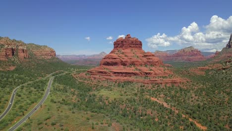 sedona red rock mountains and highway aerial drone 4k pull back