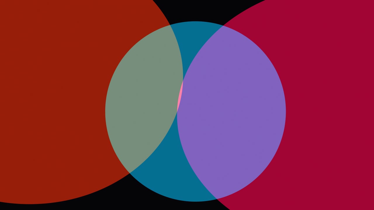 Abstract Animation of Overlapping Colorful Circles on Black Background