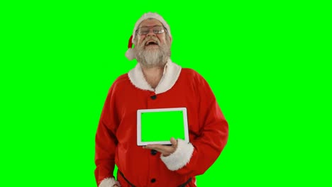 Weihnachtsmann-Hält-Digitales-Tablet