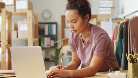 woman working from home on laptop