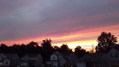 Neighborhood-to-sky-drone-shot-at-sunset