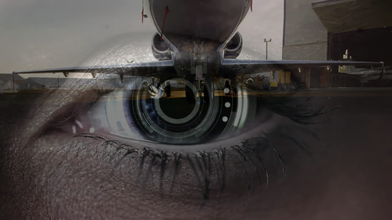 Close-up of eye showing airplane landing animation seamlessly blending with pupil