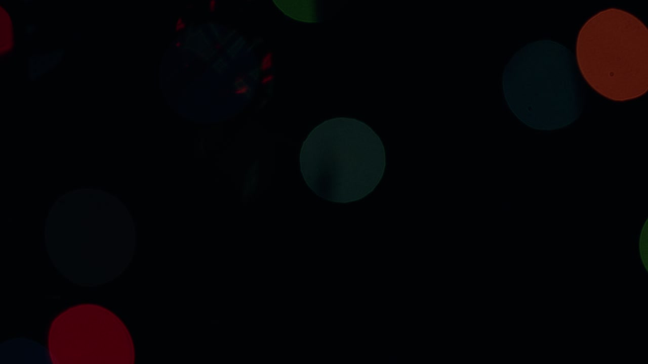 Flashing multicolored circles. Twinkling bulbs of garlands. Static