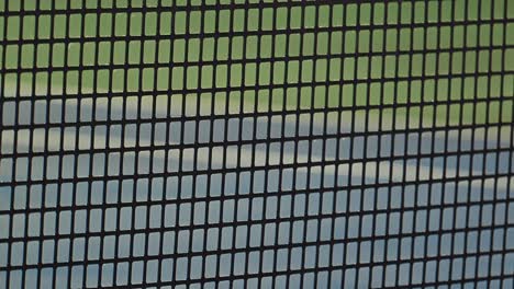 close-up of a professional tennis net designed for atp tournaments, made with durable rubber material