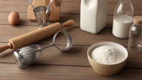 baking ingredients and tools on a wooden table