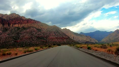 red rock canyon national conservation area and highway scenes from drivers pov